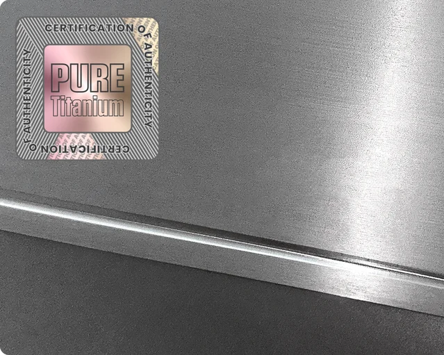 Close-up of titanium certification mark and surface texture