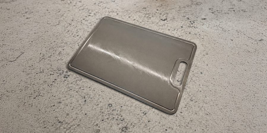Customer using a titanium cutting board